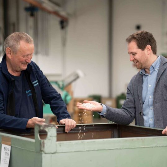 Christian Friedenstab and an employee monitor the quality of raw materials as part of quality management